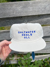 Load image into Gallery viewer, Salt Water Heals - Tofino Surf Association hats