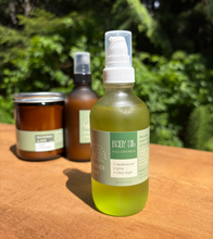 Load image into Gallery viewer, Summer Camp Body Oil - Caravan x Emerald Earth
