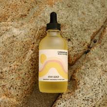 Load image into Gallery viewer, Stay Gold Body Oil - Caravan x Emerald Earth
